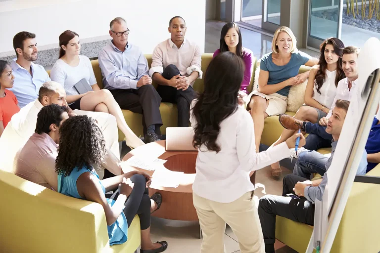 Workplace facilitation meeting focused on conflict resolution and team harmony.